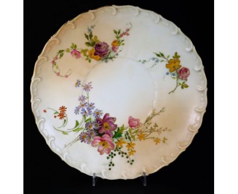 An early 20thC Royal Worcester blush ivory cabinet plate, with scroll rim,  handpainted with flower with gilt highlights, no.