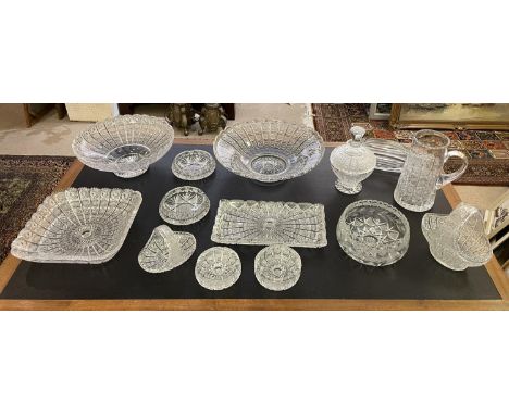 A COLLECTION OF CUT CRYSTAL GLASS, including a water pitcher lidded bowl, baskets, trays, etc. (Qty) 