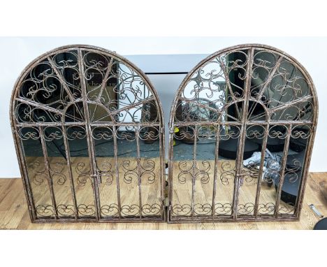 ARCHITECTURAL WALL MIRRORS, a pair, gated design, aged metal frames, 88.5cm x 69cm. (2) 