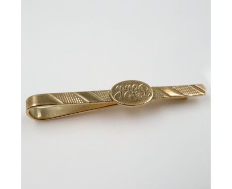 9ct gold tie clip, engraved cartouche with initials JHB, 3.6g. UK P&amp;P Group 0 (£6+VAT for the first lot and £1+VAT for su