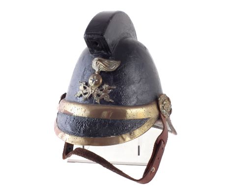 Victorian Fire Brigade leather and brass helmet, the inside marked CCFB, 24cm high