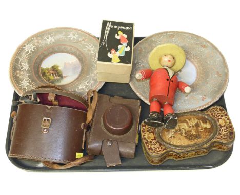 A collection of items t include a Digna Camera, Viking 8x25 binoculars, wooden doll, boxed Mampewka doll, two continental lan