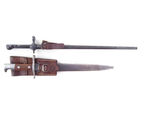 Swiss M1899 bayonet and scabbard, the blade stamped Neuhausen S.I.G, with leather frog stamped Muller, also an M1892 Crucifor