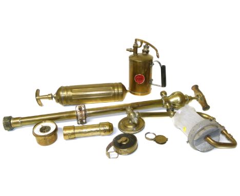 Collection of brass items, to include a wall lamp, pump, fire extinguisher, lovers' candle, tape measure, barometer and magni