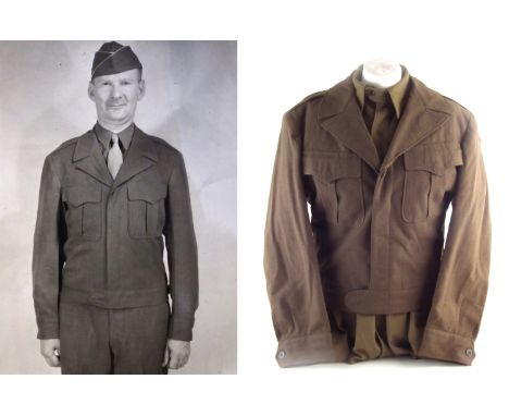 U.S. Army "Ike" Eisenhower prototype jacket, size 38R, of two pocket BD type with white and blue Army service forces roundel 