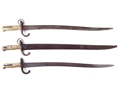 Three M.1866 Chassepot rifle bayonets , one with scabbard, 71cm overall length