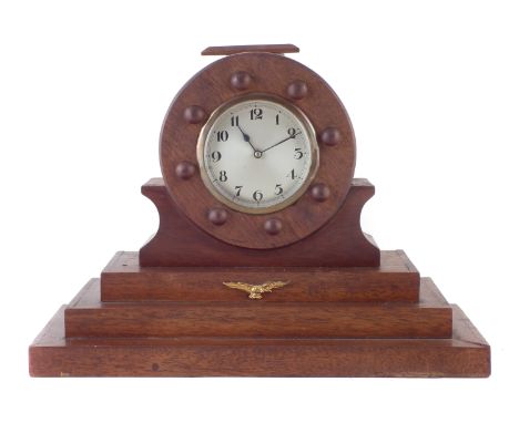 Aircraft propeller boss mantle clock , with mechanical movement, with key, the mahogany stand fitted with RAF eagle. 26cm hig