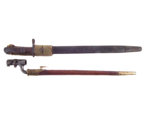 Remington P14 bayonet and scabbard and frog , dated 1913, also an Enfield rifle socket bayonet and scabbard, (2) the largest 