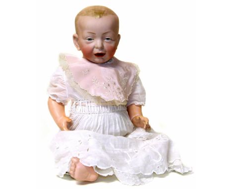 Kammer &amp; Reinhardt doll, mould number 100, marked K &amp; r with a star to the back of the head, 49cm high. We are unable