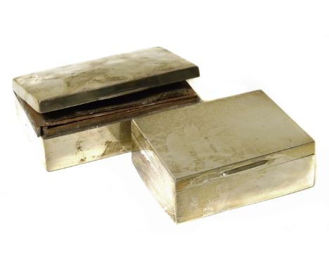 Two silver cigar cases. We are unable to do condition reports on our Interiors Sale