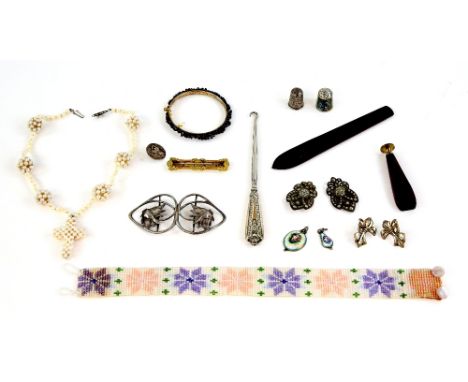 Mixed group of items including a garnet and silver gilt bangle, a vintage beaded choker, German Art Nouveau silver buckle, cu