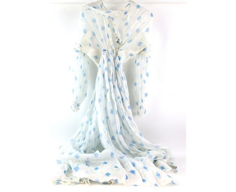 Amended description A Victorian white muslin long dress with blue diamond print, partly boned bodice, frilled shoulders and c