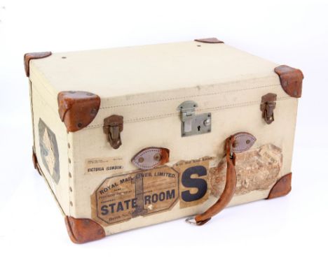 A pigskin suitcase fitted with various compartments and various assorted glass bottles , not complete, with outer protective 