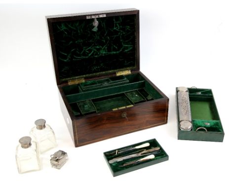 19th century rosewood travelling box, the fully fitted interior of  green velvet, including manicure items, toilet bottles a 