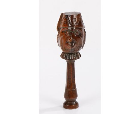 18th Century English yew wood grotesque face nutcracker, the face of a bearded man wearing a fez, the reverse with an opening
