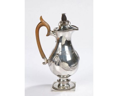 Continental silver hot water jug, possibly Portuguese, the hinged domed cover with pineapple finial and beaded rim, the balus