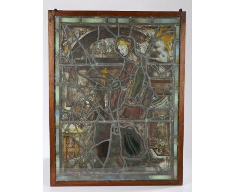 Stained glass panel, probably 16th Century elements, depicting a figure bringing the&nbsp;ciborium to a praying monk within a