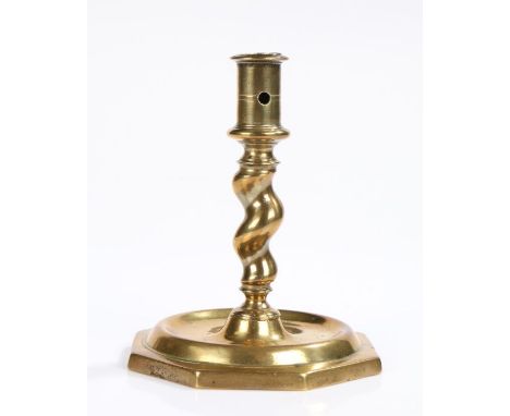 17th Century Spanish candlestick, the pierced socket above a twist stem and wide octagonal base, 15.5cm high
