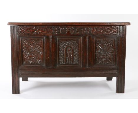 An unusual Charles II oak coffer, Cumbria, dated 1681, having a triple-panelled lid, the front also with three panels, a pair