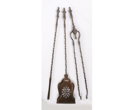 George III set of three steel fire irons, each with a finial topped handle above a spiral stem, to include a shovel, poker an
