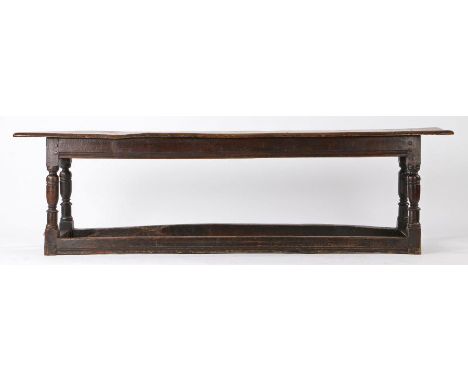 Charles II joined oak form or long bench, circa 1630, the single seat board, run moulded rails on baluster over turned legs j