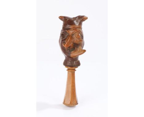 18th Century English yew wood grotesque face nutcracker, with a dual face showing a figure with an angled expanded chin and a