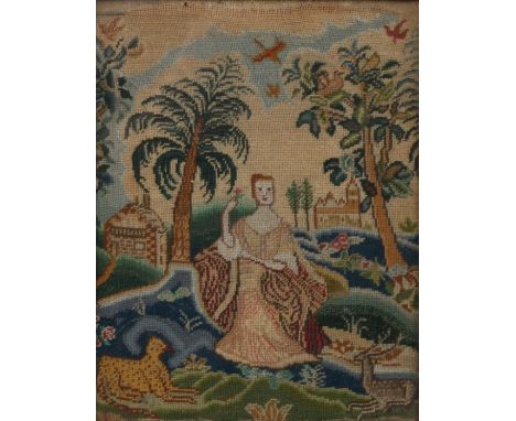 An English needlework picture, circa 1700 with a woman in a garden with stag and leopard reclining to either side with a trai