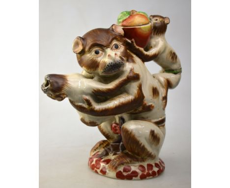 A polychrome enamel ewer modelled as a Macaque, or other mammal, with two of its young, 24cm high