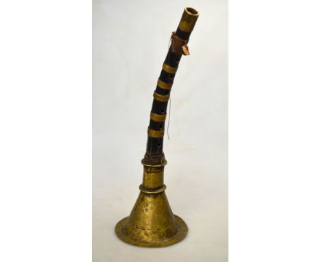 A Tibetan rgya gling with seven holes and white metal trumpet, 47.5cm long; together with a similar Himalayan wood wind instr