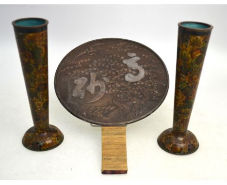 A pair of metal swords, probably for tai-chi or martial arts discipline; a Japanese Kagami decorated with a tsuru, and a mino