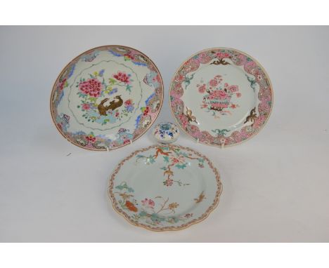 Three famille rose dishes, comprising: one decorated with birds and peony; one decorated with flowering peony; and one decora