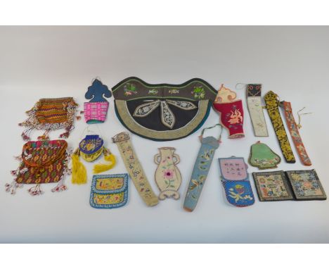 A collection of small Chinese textiles (lot) Condition Report Please note that this is a group lot where condition, wear, soi