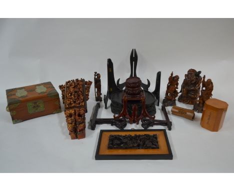 Four Chinese wood figures, including one of Shoulao, 16.5 cm high and one of Li Tie Guai; together with twelve wood stands; a
