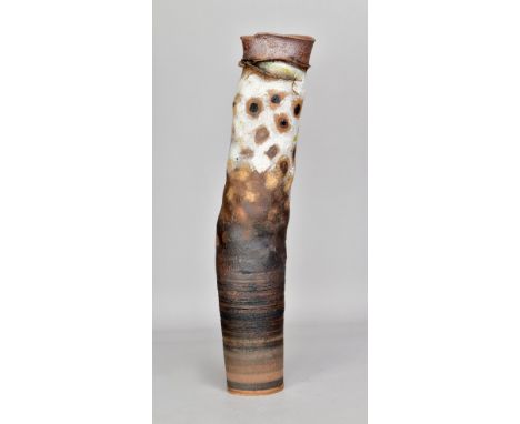 ROBIN WELCH (1936-2019); a tall cylindrical stoneware leaning vessel, impressed mark and dated 1985, height 50cm. (D)Addition