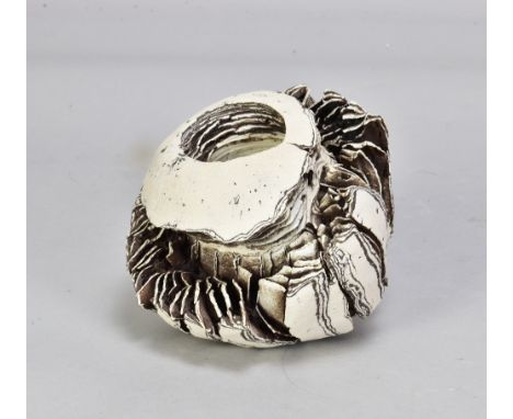RAFAEL PEREZ (born 1957); a sculptural form, laminated white porcelain and black earthenware, height 11cm. (D)Provenance: Pur