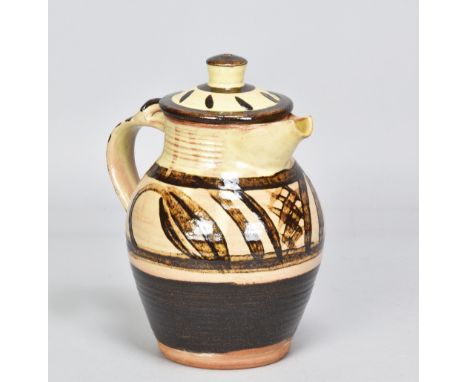 MICHAEL CARDEW (1901-1983) for Winchcombe Pottery; a large slipware coffee pot with iron brush decoration on yellow ground, i