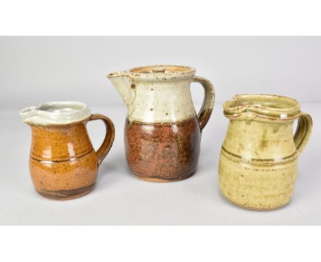 RICHARD BATTERHAM (born 1936); a stoneware coffee pot and two jugs, tallest 14.5cm (3). (D)Additional InformationChip to coff