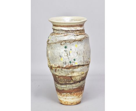 ROBIN WELCH (1936-2019); a stoneware vessel with incised body partially covered in pale grey glaze with enamel spots, impress