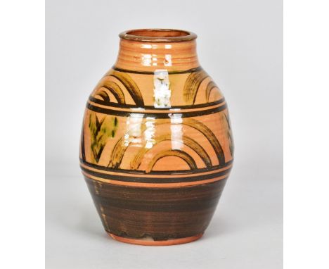 MICHAEL CARDEW (1901-1983) for Winchcombe Pottery; a large slipware vase with iron brush decoration on peach coloured ground,