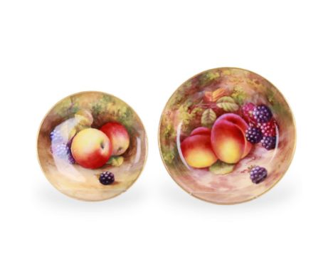 Two Royal Worcester fruit painted pin dishes, hand painted with peaches and blackberries, and apples and blackberries, the fi