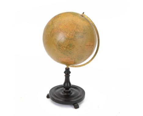 20th century Phillips terrestrial globe, raised on turned ebonised base, H54cm