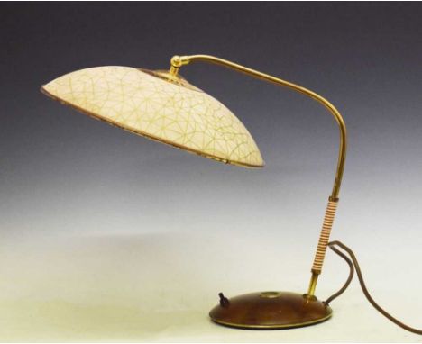 Mid Century desk lamp, circa 1950, probably Continental, the adjustable ribbed opaque plastic shade with gilt geometric decor