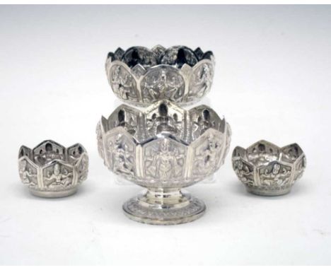 Set of four Indian white metal bowls in the Swami manner having decorative embossed panels of deities and goddesses, 8cm high