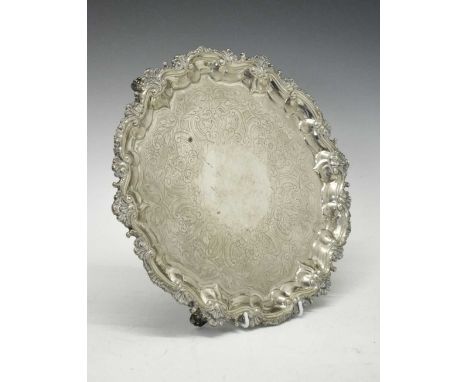 George III silver salver with raised acanthus leaf border and later foliate engraved base, raised on four scroll feet, sponso