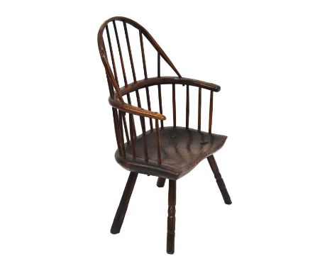 Early 19th Century primitive ash and elm hoop-back Windsor armchair, the two-tier stick back above substantial elm saddle sea