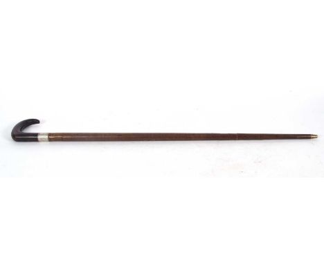 Late Victorian rams horn handle and sectional composition walking stick. A nickel mount bearing a monogram, 87cm long