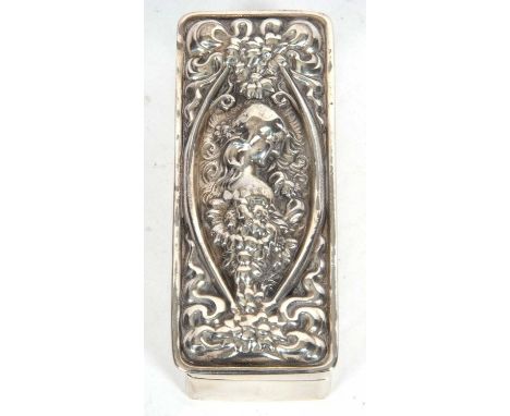 Continental trinket box of rectangular form having a pull off lid and heavily embossed with the profile of a young lady in a 