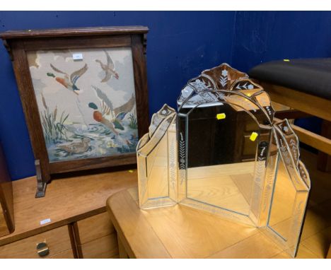A vintage oak glazed fire screen together with a modern triple mirror and two pears style prints. (4) 