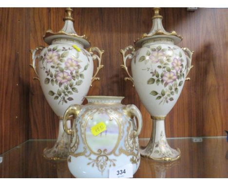 A pair of vintage decorative lidded vases together with another (3) 