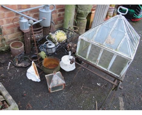 A large selection of metal and cast garden ornaments 
